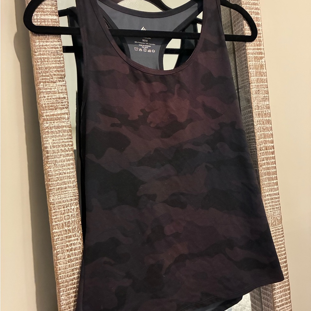 Black camouflage tank